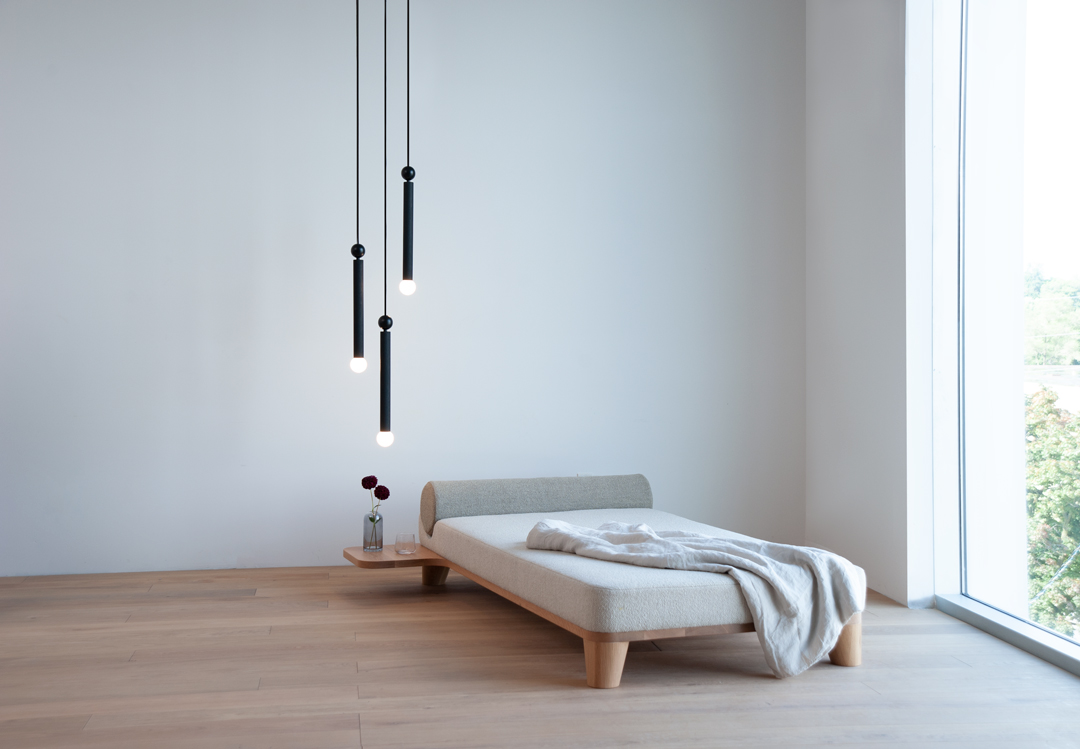 The Constellations Pendants lighting fixture over the Swell Day Bed by hollis+morris