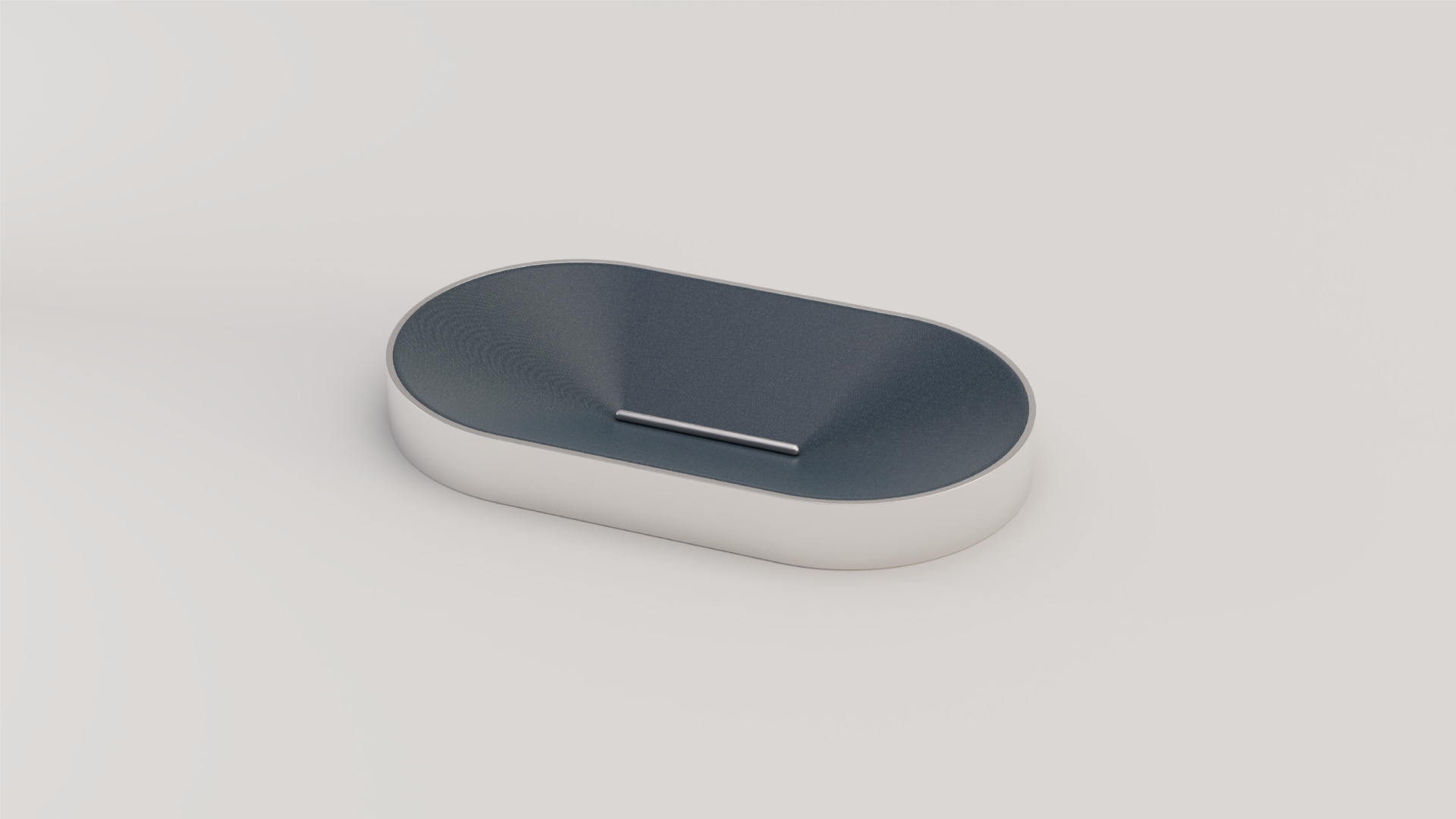 Silver metal and leather curved tray placed against white background