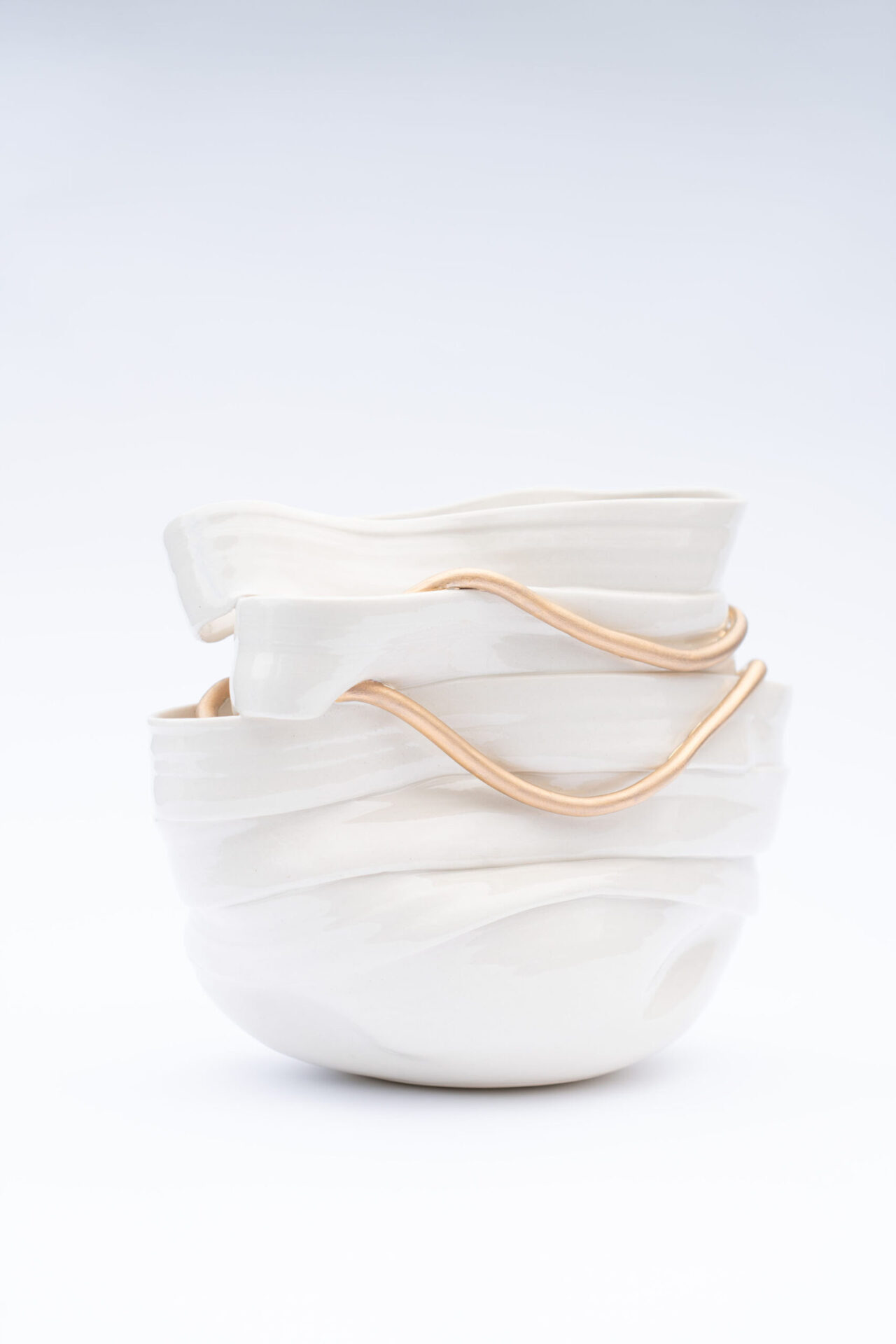 White ceramic ribbon vase with gold detail
