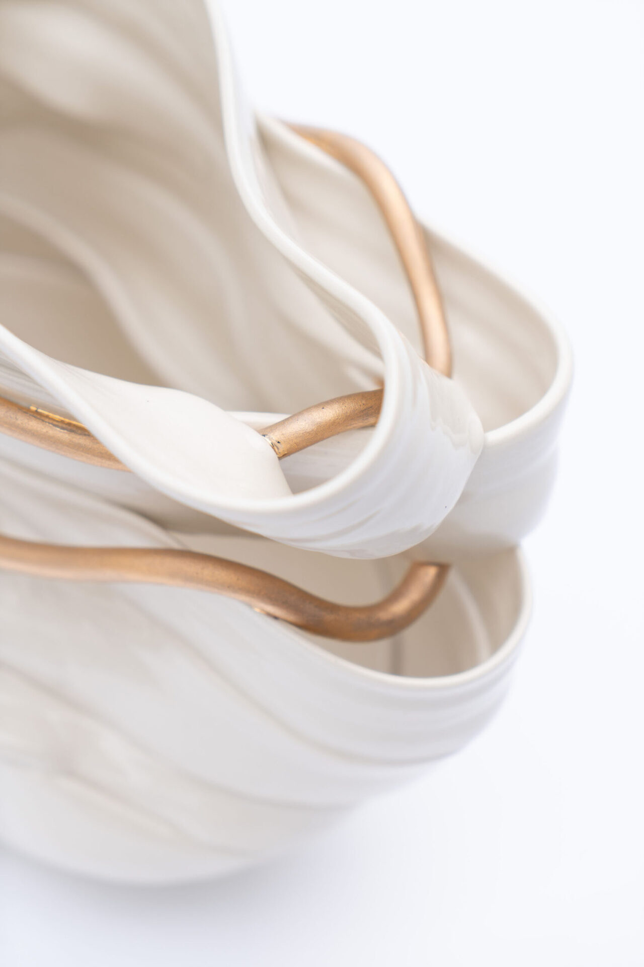 White ceramic ribbon vase with gold detail