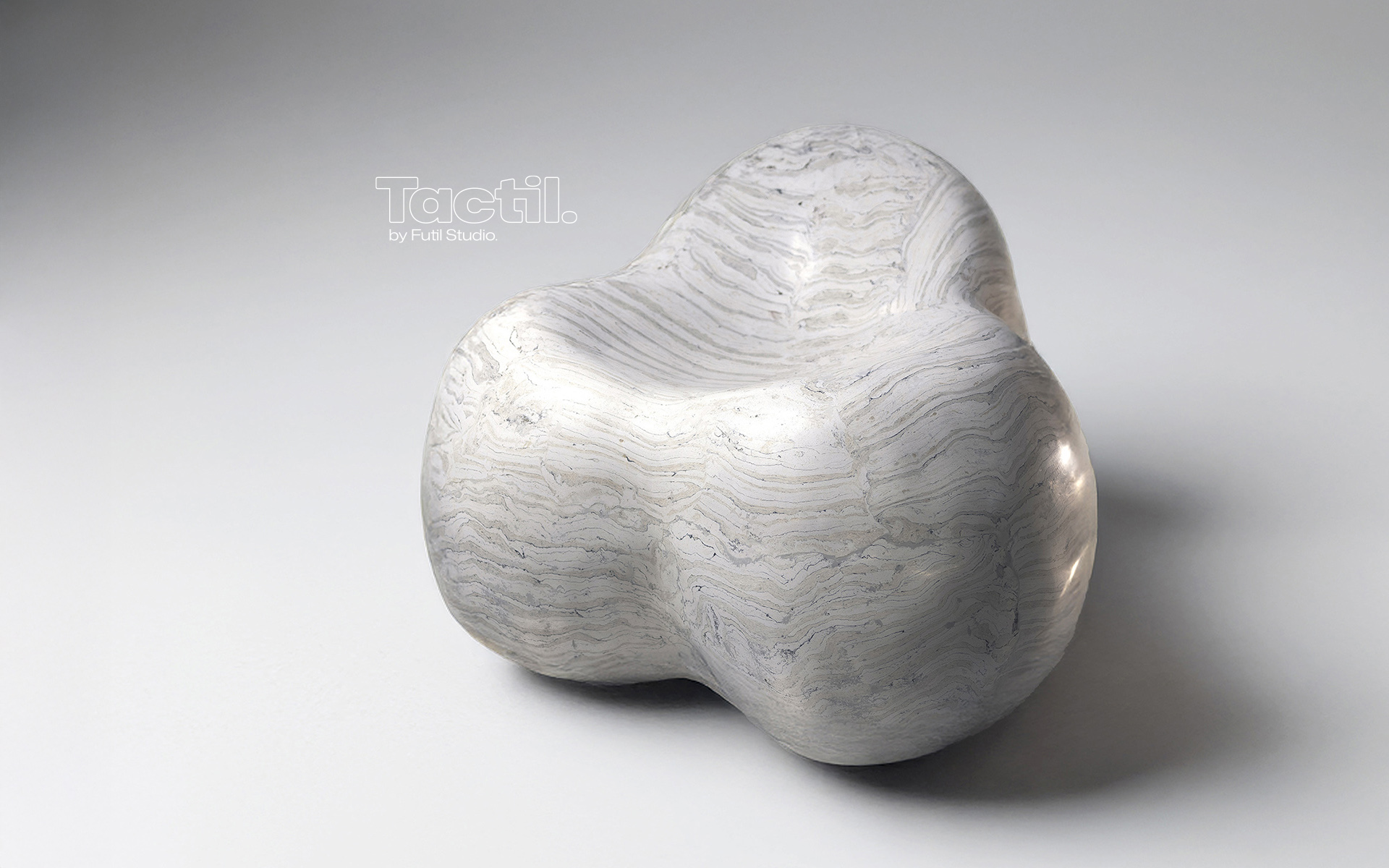 The Bob chair, featuring custom layered scagliola with earth tone pigments. Its inviting organic shape possesses a subtle, compelling allure.