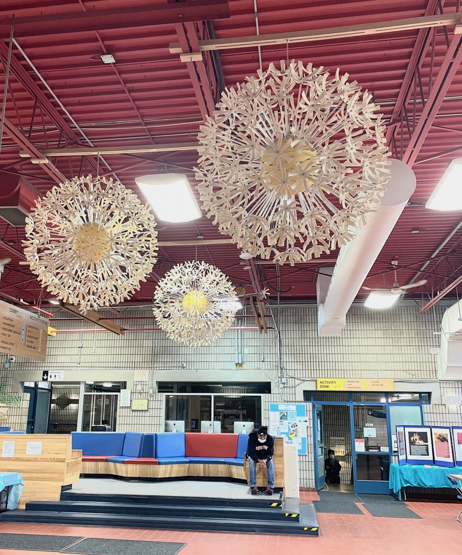 3 large Dandelion Seed Head sculptures suspended from the ceiling