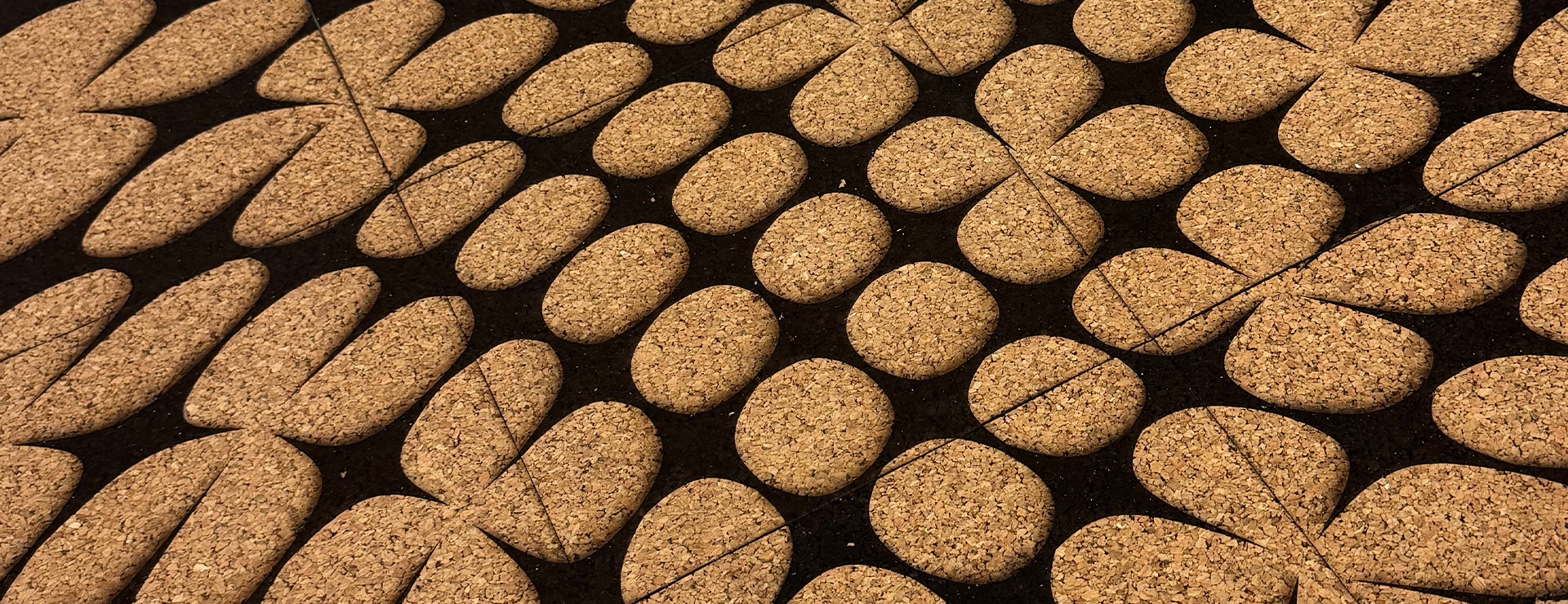 Close up image of curved pattern burned into cork.