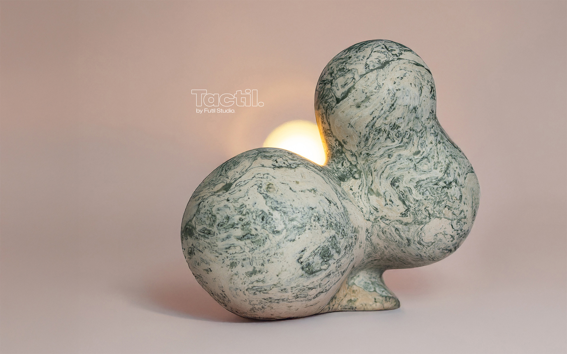 Pete Moss table lamp. A sculptural creation that beckons to be caressed. Its organic marble veining mimics nature's gentle moss, drawing you into its mesmerizing depths.