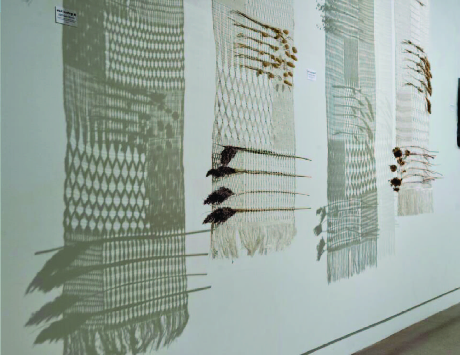 detail of two openwork textile panels with plant insertions