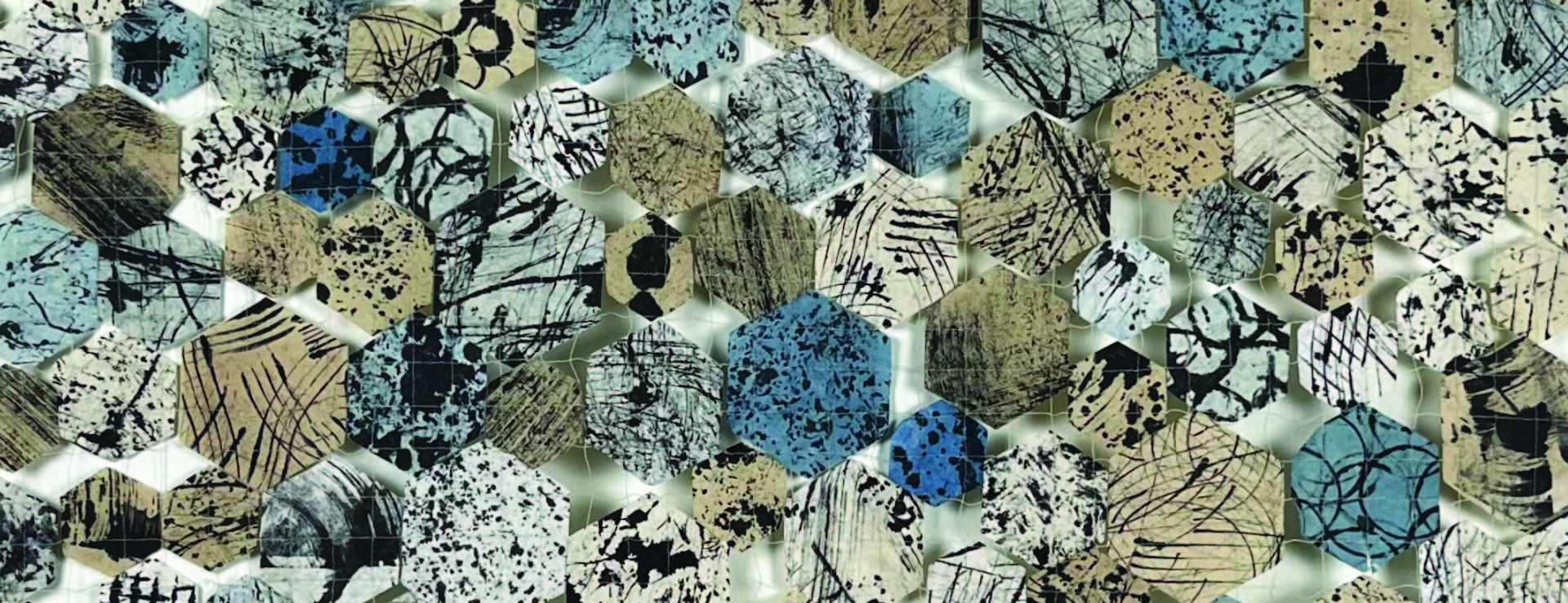Close up of a variety of sizes of white, brown and blue paper hexagons decorated with ink and dye, and sewn into an open thread grid.