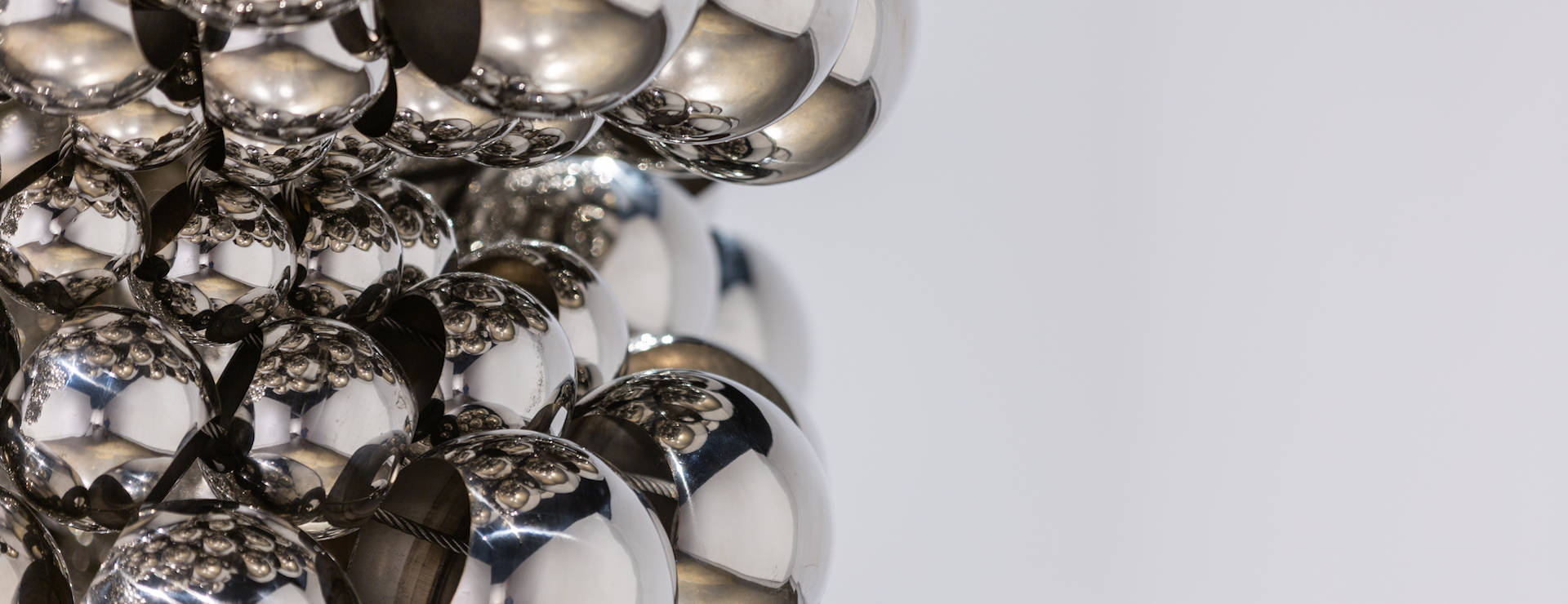 abstract sculpture using stainless steel spheres