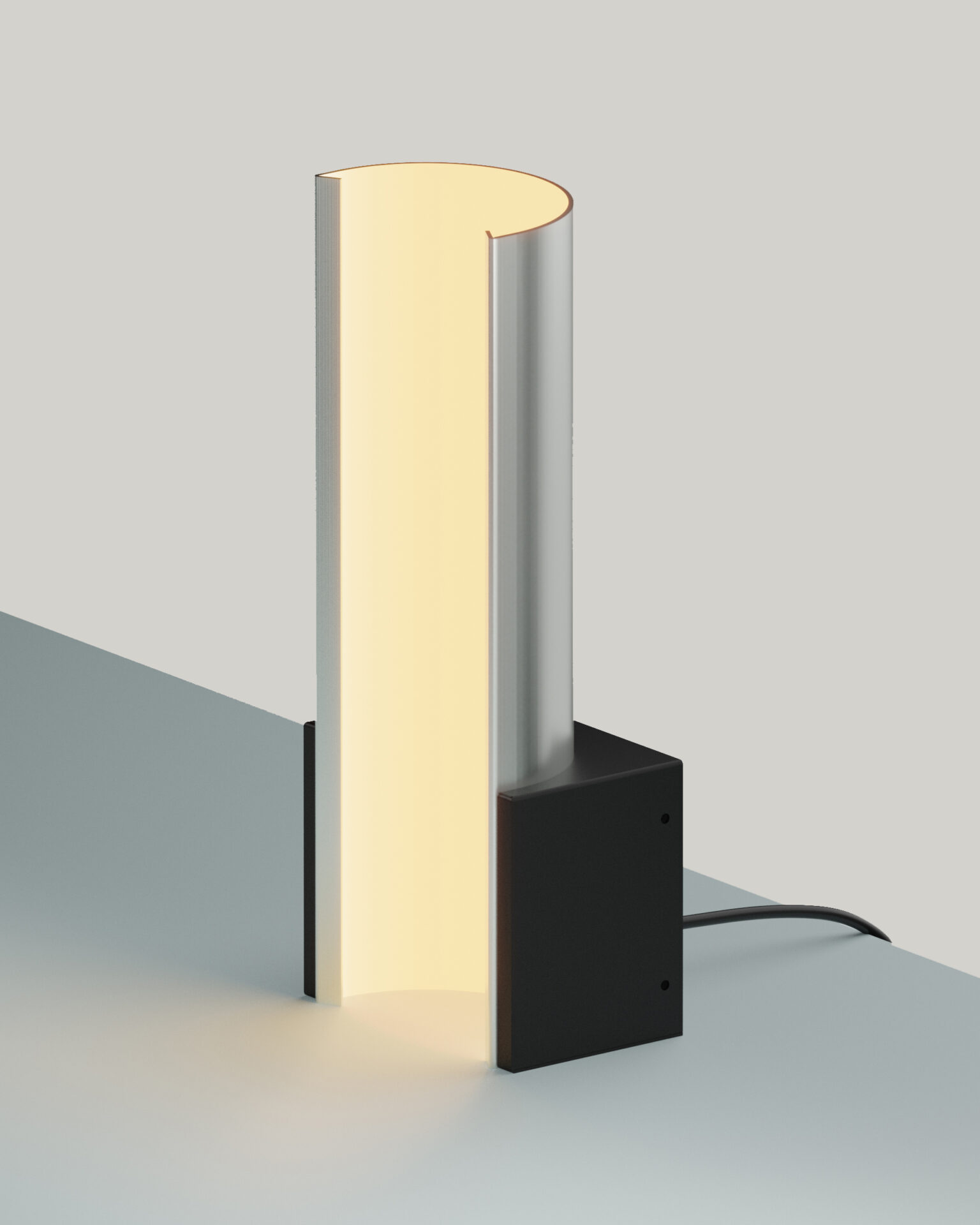 A table lamp. The main form looks like a glowing arc. The arc faces upward and a rectangular base holds it steady.