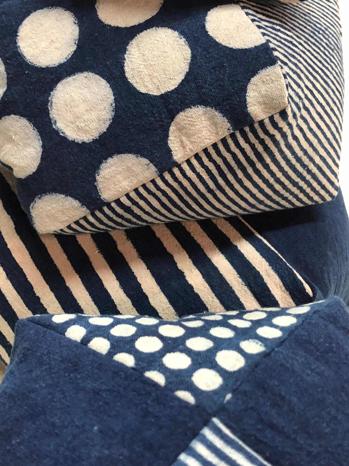 Indigo dyed fabrics with resist patterns